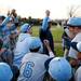The Skyline team huddles together after defeating Chelsea on Monday, April 22. Daniel Brenner I AnnArbor.com